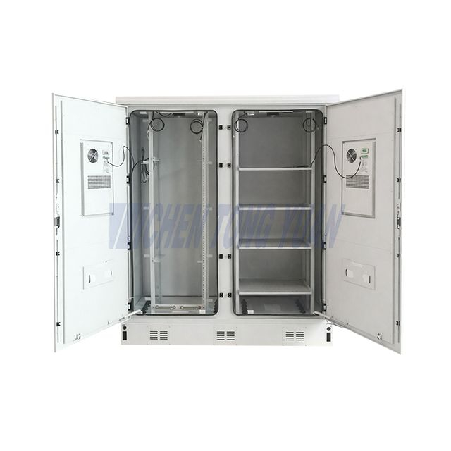 air conditioned field cabinet open door showing internal equipment mounting space